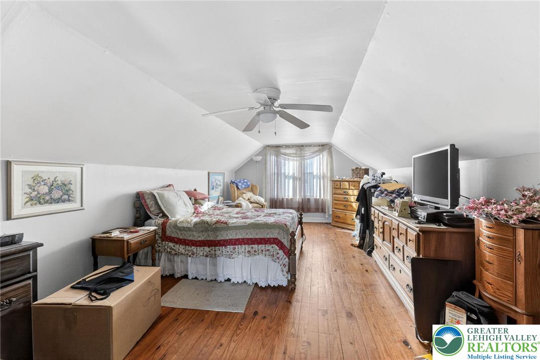 5370 Hanoverville Road Bethlehem, PA 18017 - Photo 13 of 24 a living room with furniture and a flat screen tv