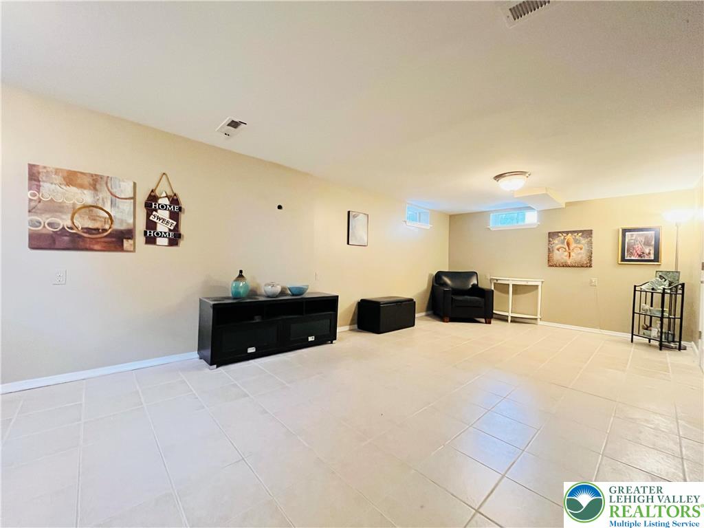 5370 Hanoverville Road Bethlehem, PA 18017 - Photo 17 of 24 a large bedroom with a bed and a view of bathroom