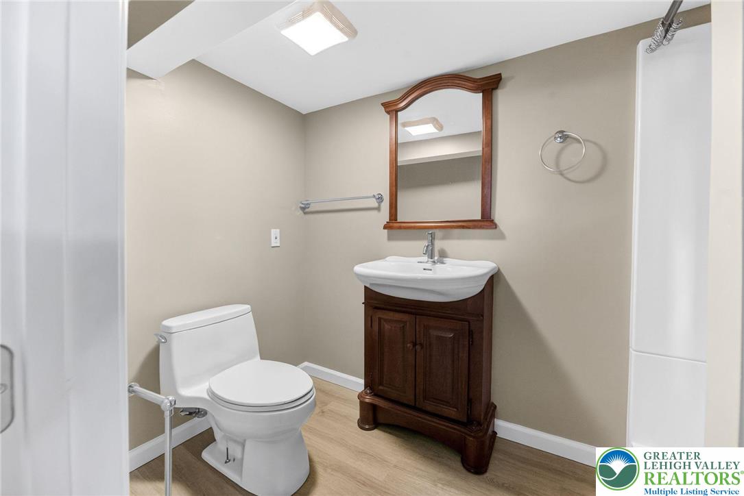 5370 Hanoverville Road Bethlehem, PA 18017 - Photo 19 of 24 a bathroom with a toilet a sink and mirror
