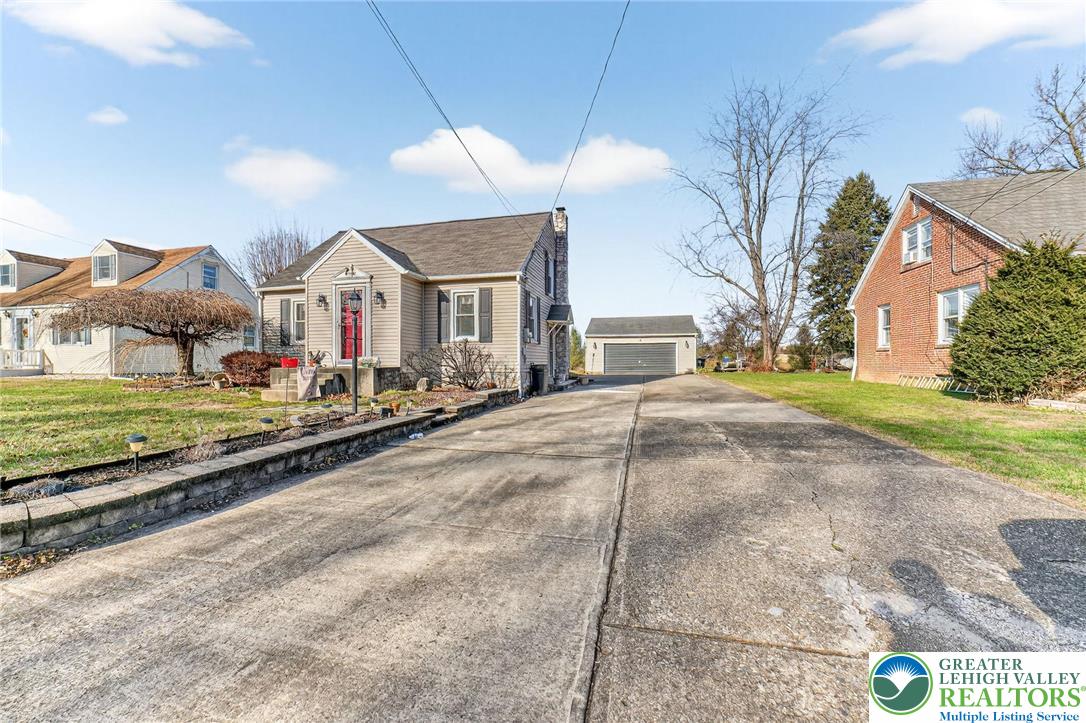 5370 Hanoverville Road Bethlehem, PA 18017 - Photo 2 of 24 a front view of a house with a yard