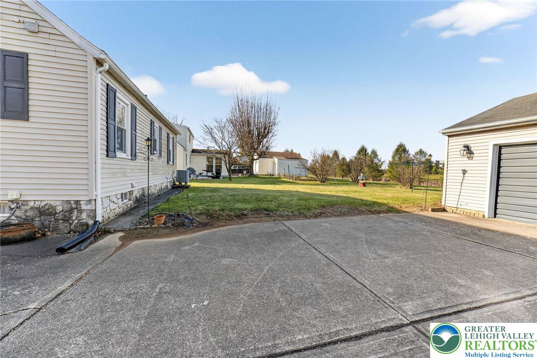 5370 Hanoverville Road Bethlehem, PA 18017 - Photo 23 of 24 a view of a house with a yard and garage