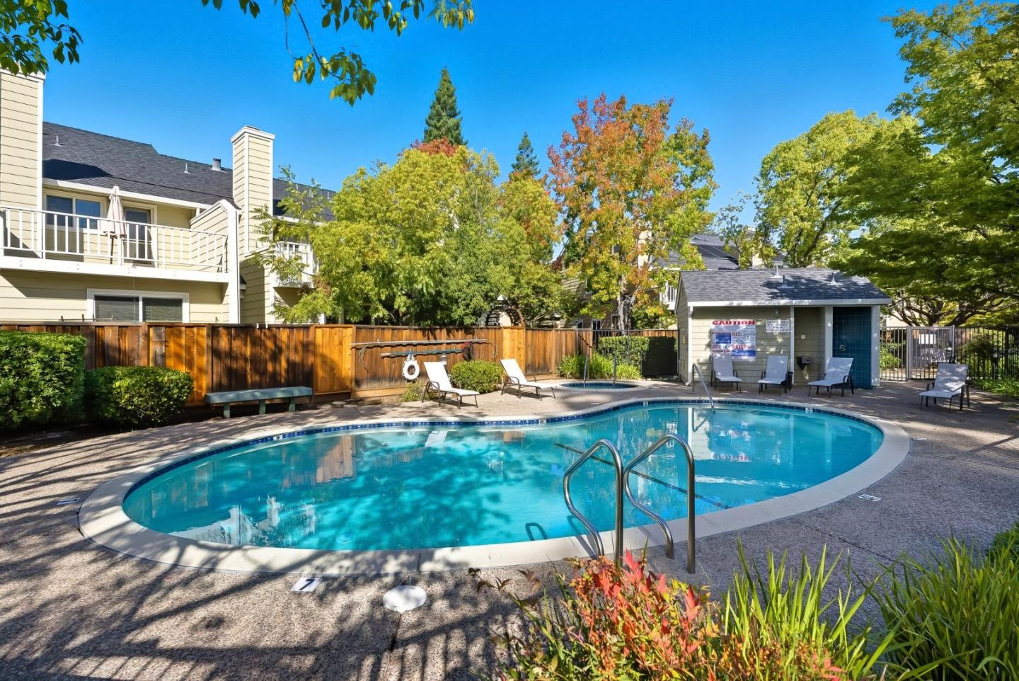 181 Ada Avenue, Unit 29 Mountain View, CA 94043 - Photo 28 of 30 a view of a house with swimming pool and sitting area