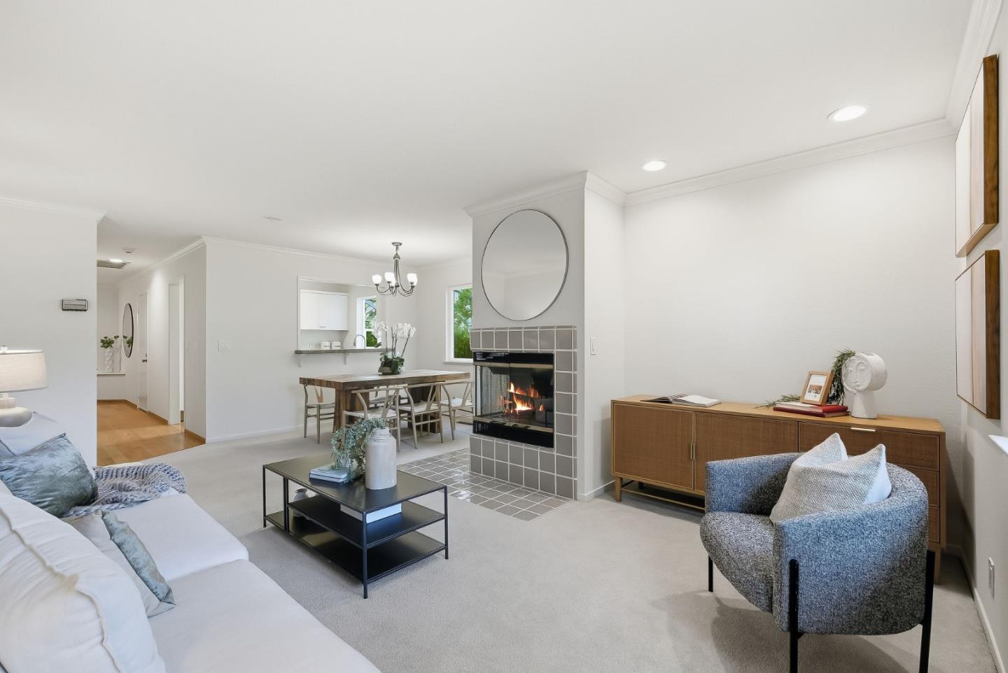 181 Ada Avenue, Unit 29 Mountain View, CA 94043 - Photo 3 of 30 a living room with furniture and a chandelier