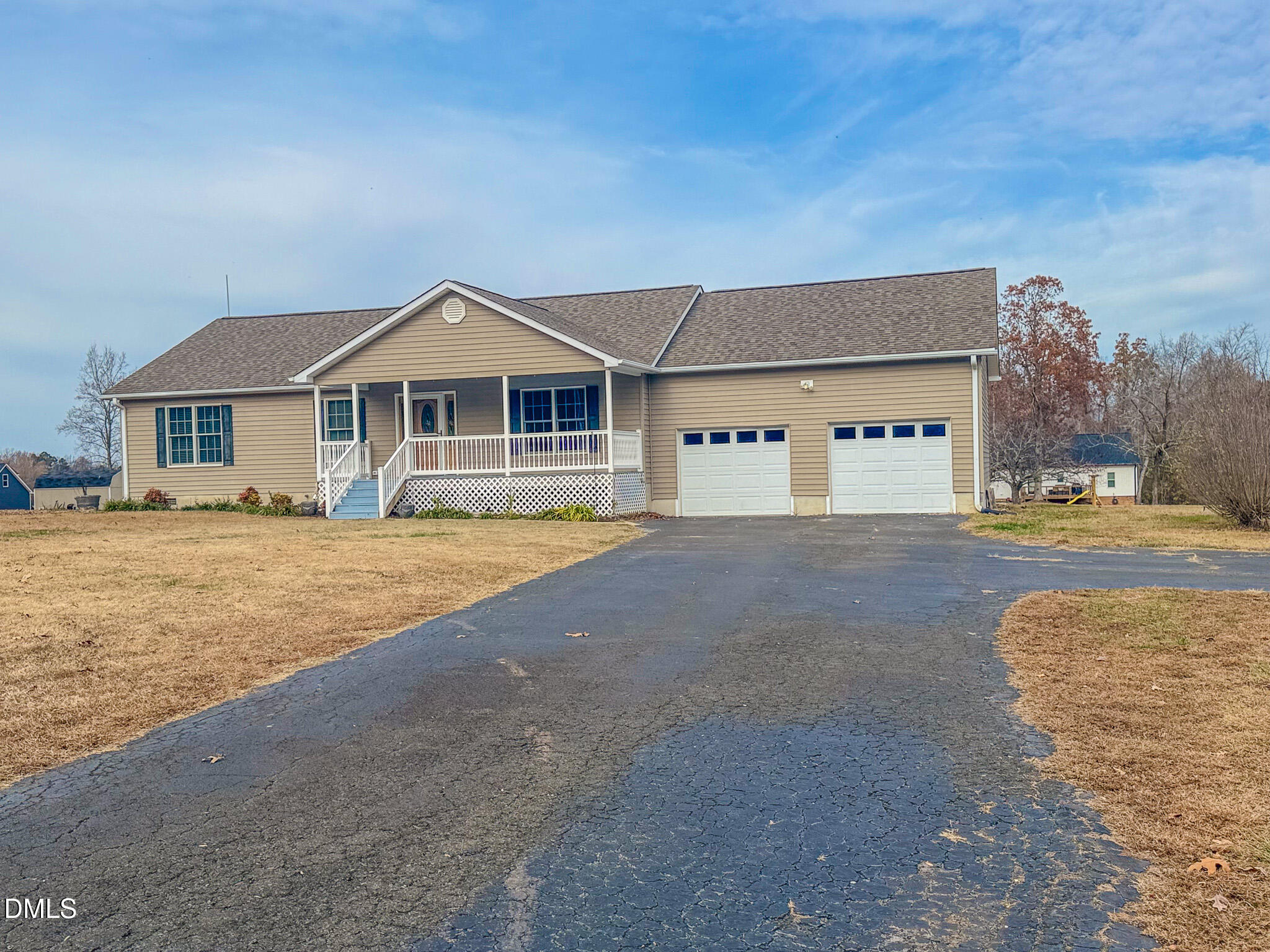 111 Fox Crossing Drive Roxboro, NC 27574 - Photo 19 of 25 a front view of a house with a yard