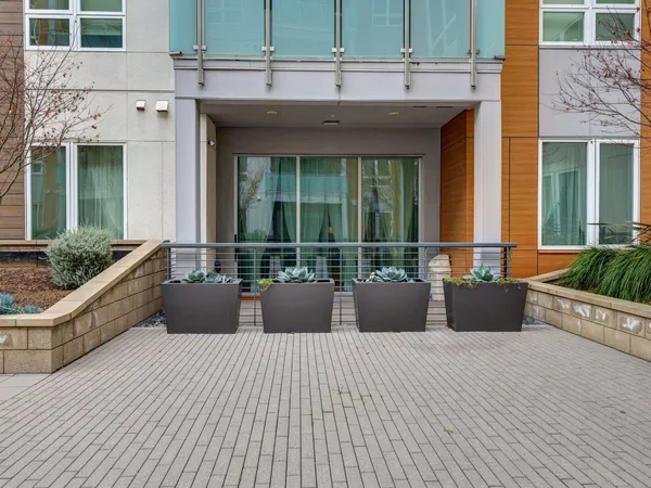 front view of a house with a large window
