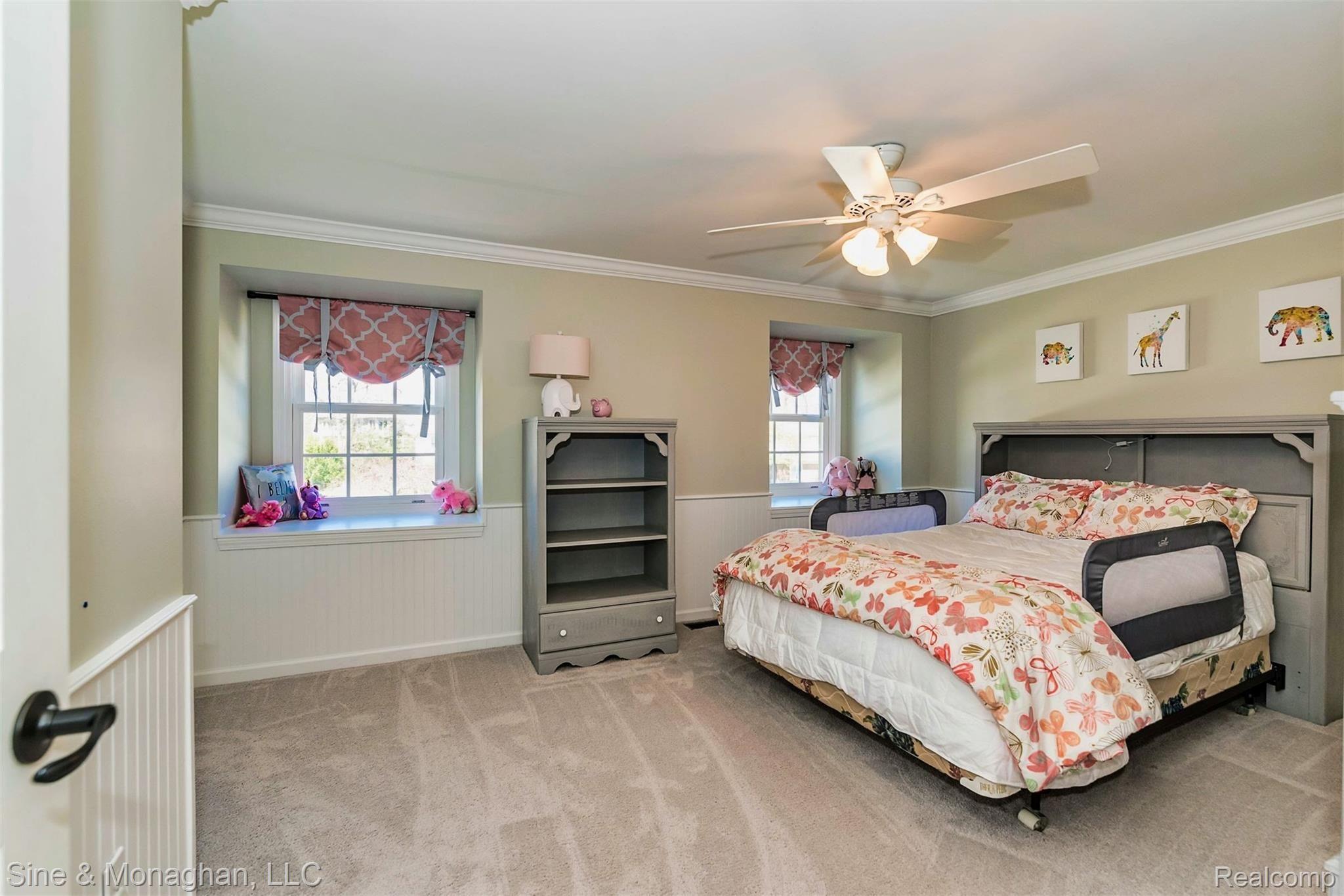 531 Shellbourne Drive Rochester, MI 48309 - Photo 31 of 51 Bedroom with beadboard and window seats