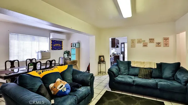 a living room with furniture and a couch