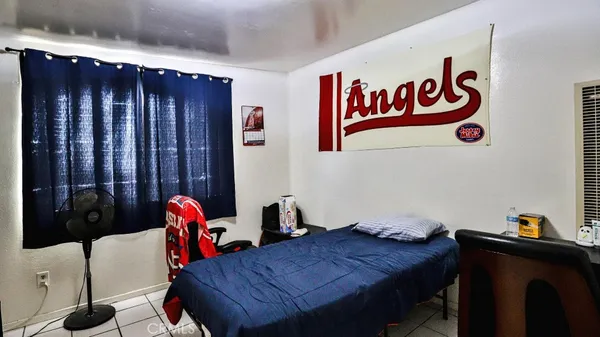 a bed room with a bed and a walk in closet