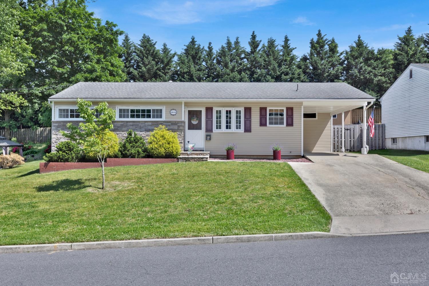 front view of a house with a yard