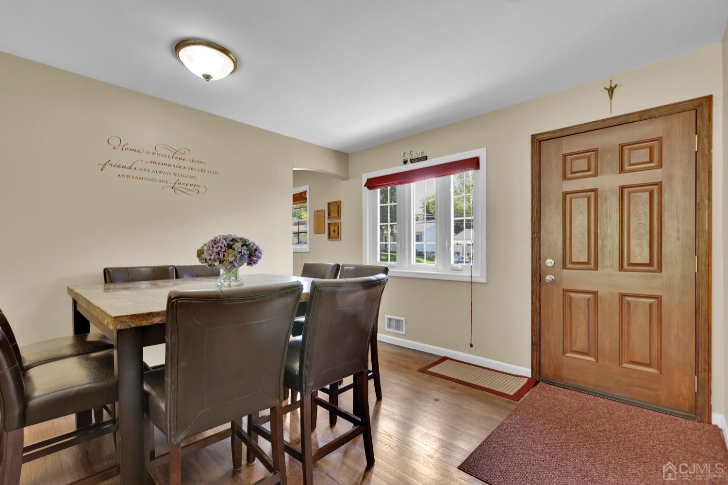 10 Rutgers Road Old Bridge, NJ 08859 - Photo 4 of 18 a view of a dining room with furniture window and wooden floor