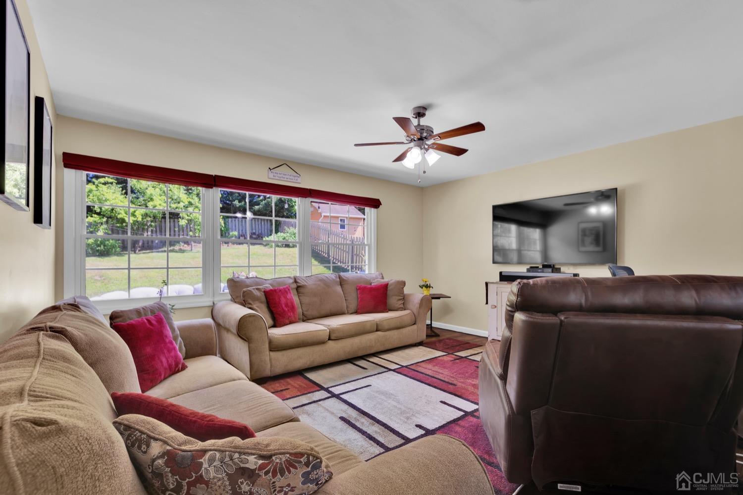 10 Rutgers Road Old Bridge, NJ 08859 - Photo 5 of 18 a living room with furniture and a large window