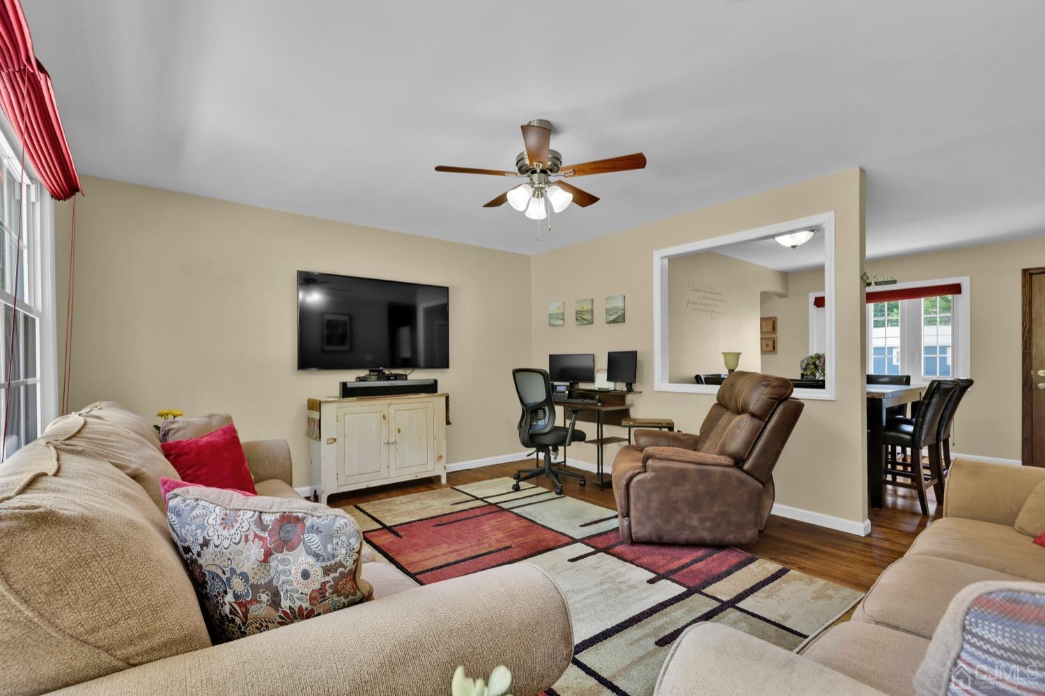 10 Rutgers Road Old Bridge, NJ 08859 - Photo 6 of 18 a living room with furniture and a flat screen tv