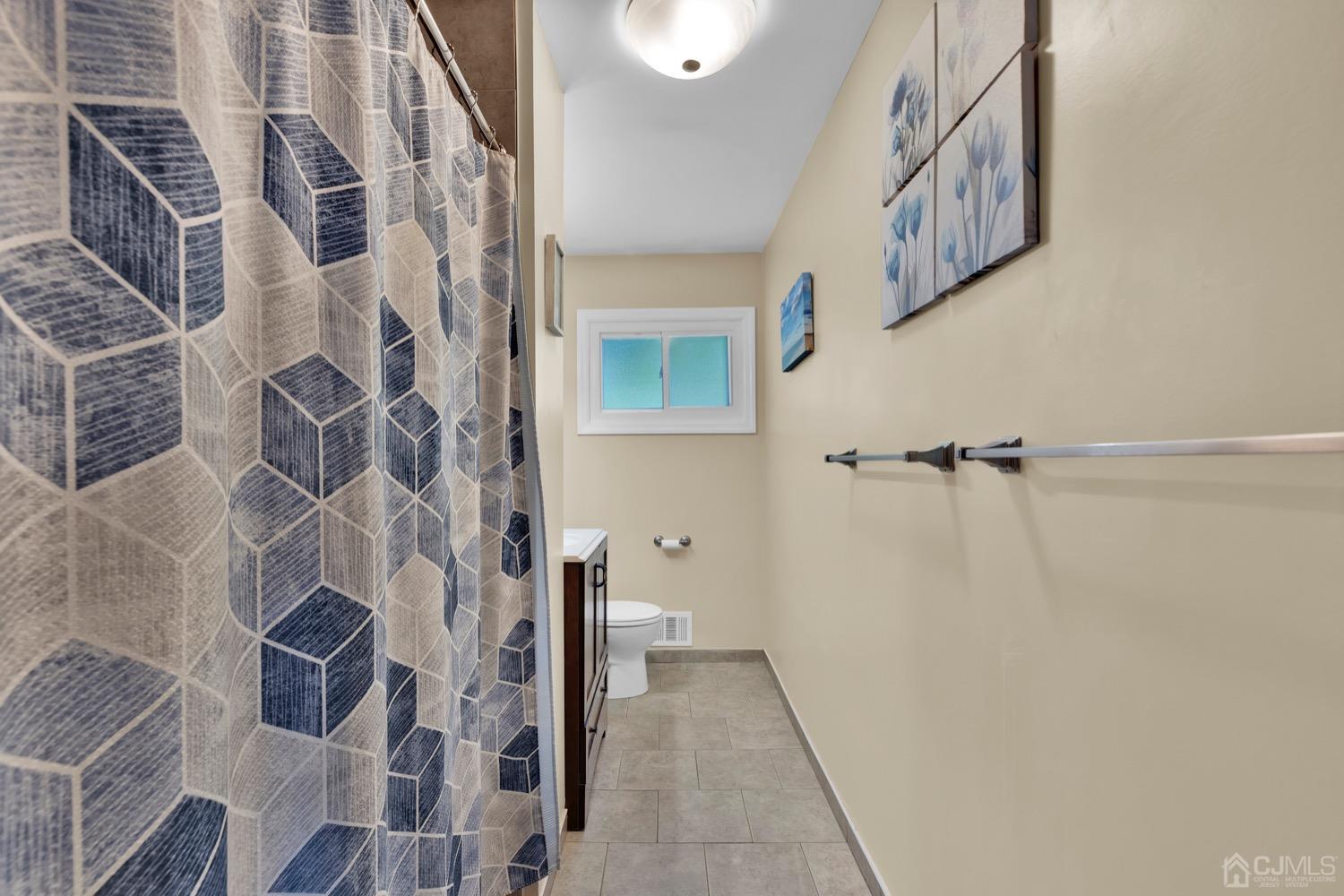 10 Rutgers Road Old Bridge, NJ 08859 - Photo 9 of 18 a view of a bathroom with a shower