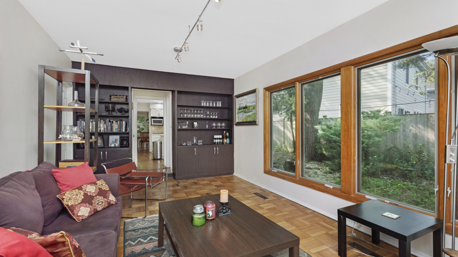 1809 Winnetka Road Northfield, IL 60093 - Photo 12 of 27 a living room with furniture and a floor to ceiling window