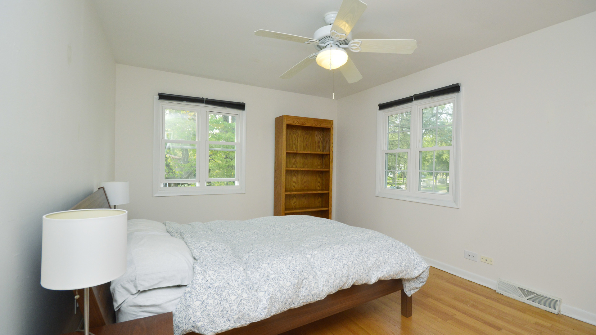 1809 Winnetka Road Northfield, IL 60093 - Photo 15 of 27 a bedroom with a bed and a window