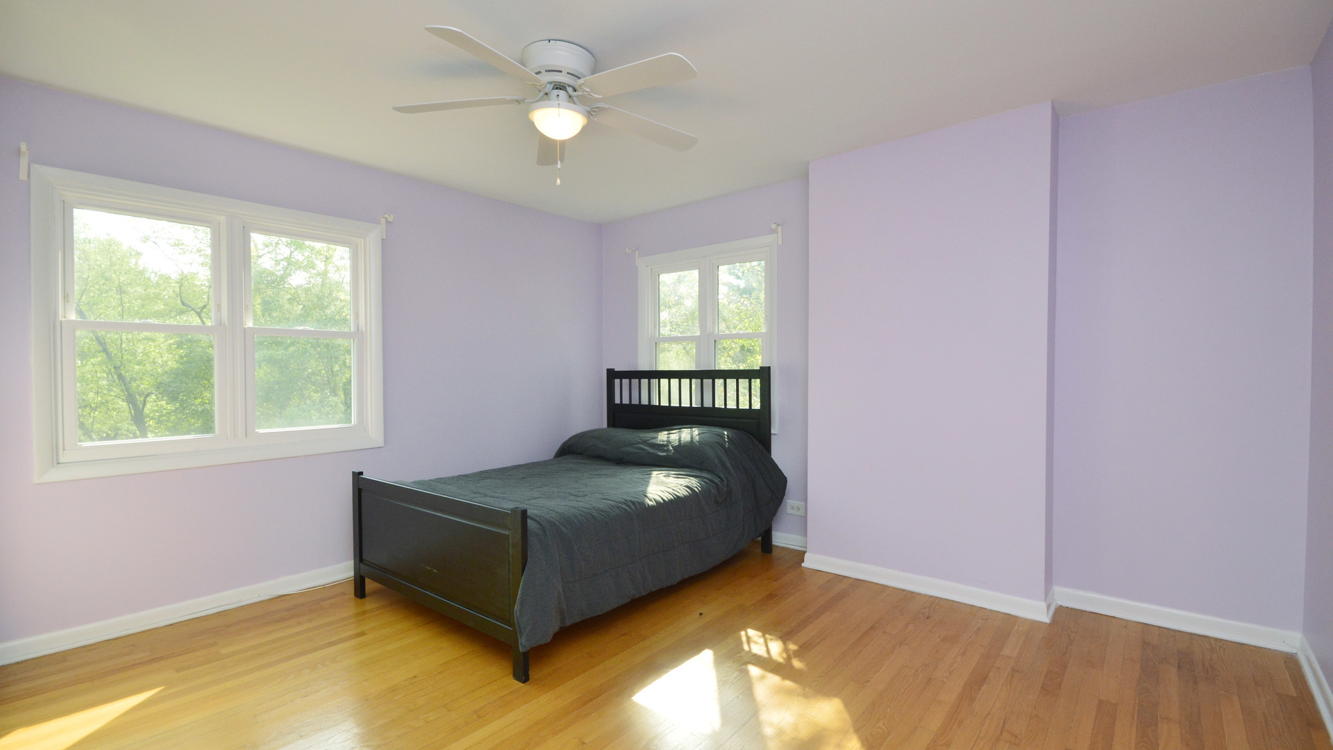 1809 Winnetka Road Northfield, IL 60093 - Photo 16 of 27 a living room with a bed and a window