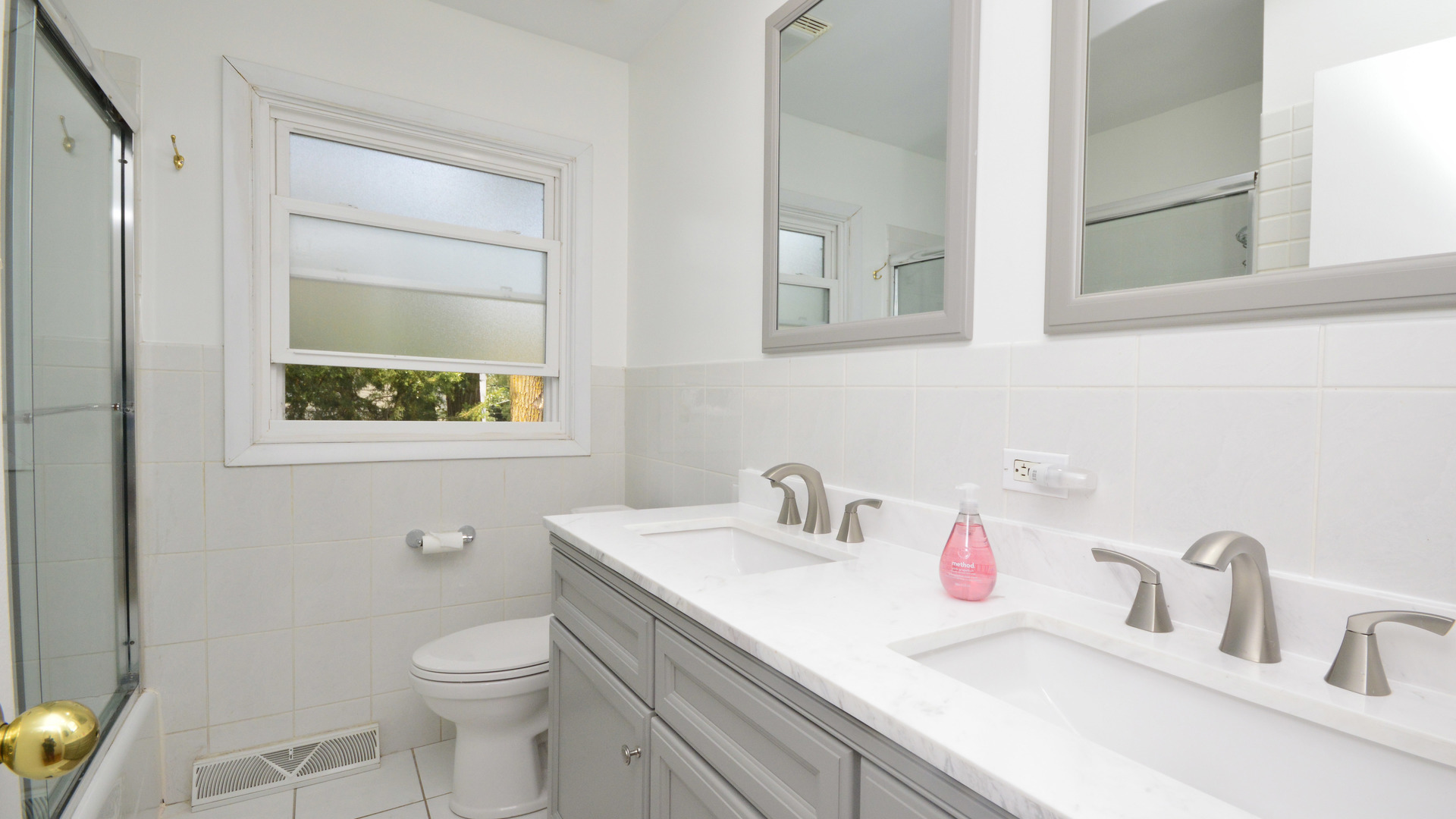 1809 Winnetka Road Northfield, IL 60093 - Photo 19 of 27 a bathroom with a sink vanity granite and toilet