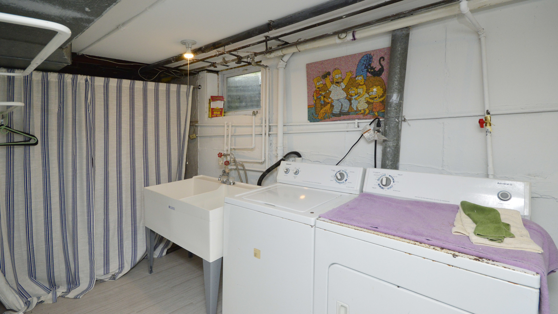 1809 Winnetka Road Northfield, IL 60093 - Photo 23 of 27 a bathroom with a sink and a mirror