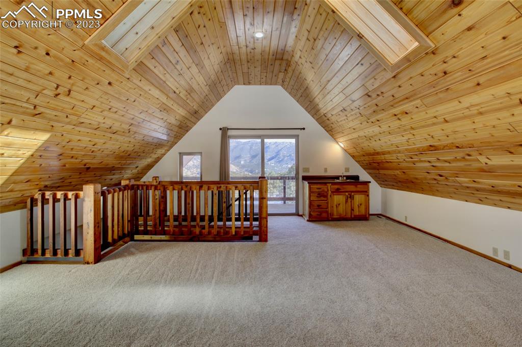 1001 Three Streams Road Howard, CO 81233 - Photo 14 of 49 a view of a porch with wooden floor and fence