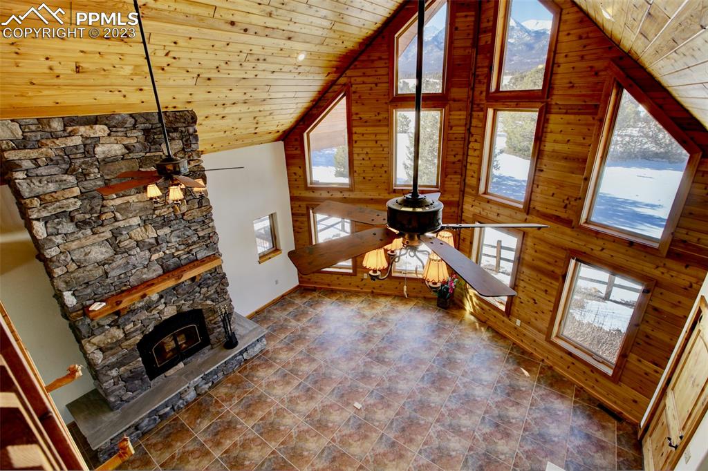 1001 Three Streams Road Howard, CO 81233 - Photo 16 of 49 a living room with furniture and a fireplace