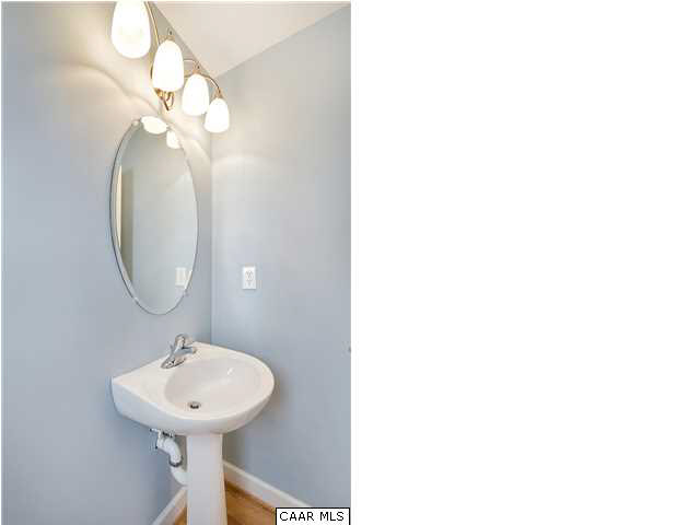 132 Roy's Place Charlottesville, VA 22902 - Photo 8 of 19 First floor half bath, not shown window providing natural light