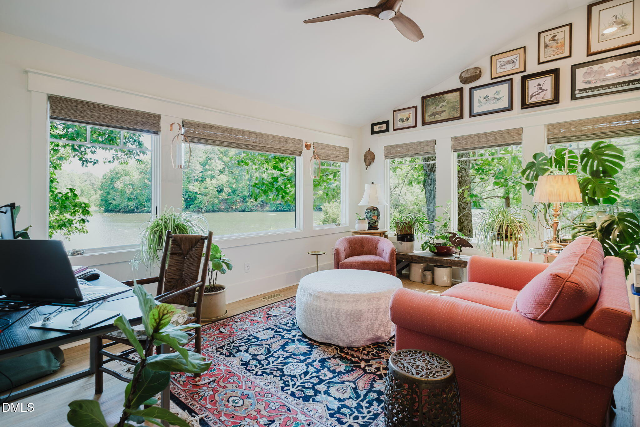 370 Robinson Ferry Road Macon, NC 27551 - Photo 30 of 85 a living room with patio furniture and a large window