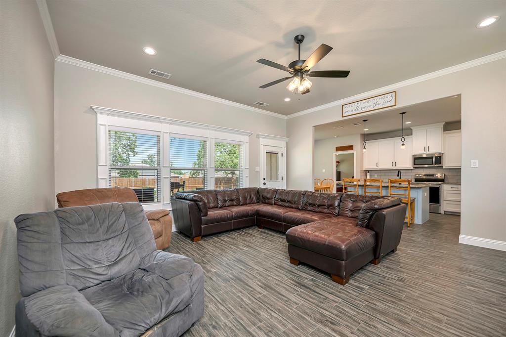 917 East 3rd Street Springtown, TX 76082 - Photo 9 of 32 Wall of windows brings in so much natural light!
