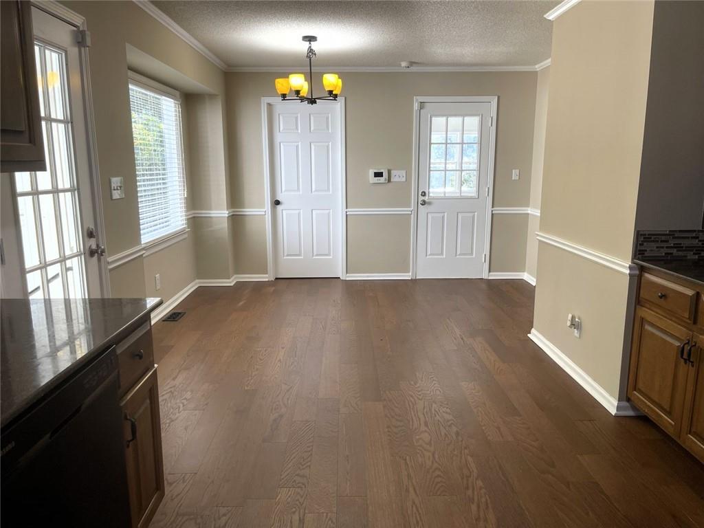31 Williamsburg Drive Northwest Rome, GA 30165 - Photo 16 of 33 an empty room with wooden floor and windows