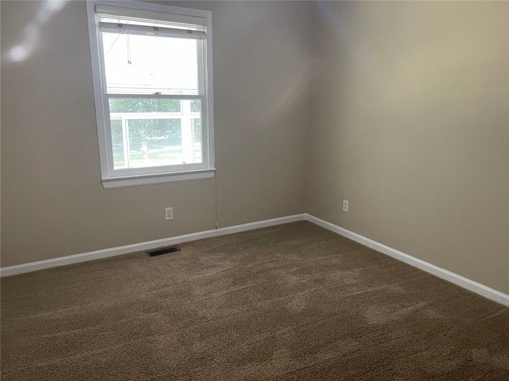 31 Williamsburg Drive Northwest Rome, GA 30165 - Photo 22 of 33 an empty room with a window