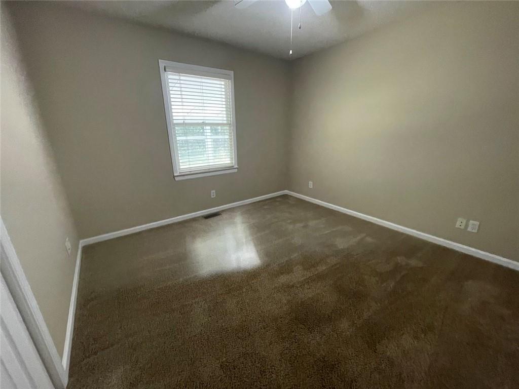 31 Williamsburg Drive Northwest Rome, GA 30165 - Photo 24 of 33 an empty room with a empty space and windows