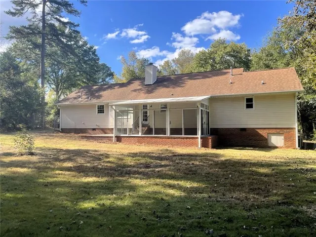 a view of a house with a swimming pool