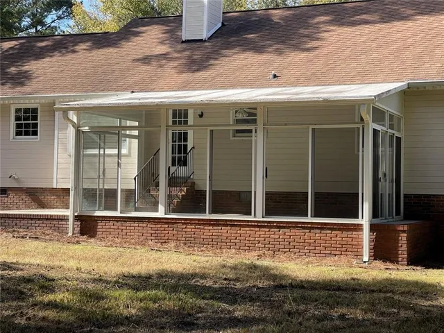 a front view of a house with a garage