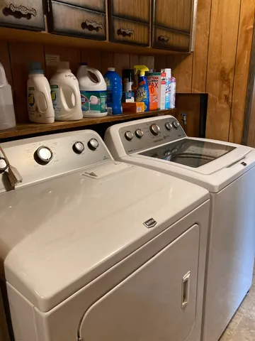 a utility room with dryer and washer
