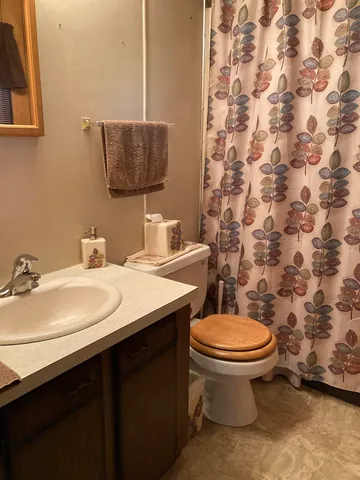 a bathroom with a sink and a toilet