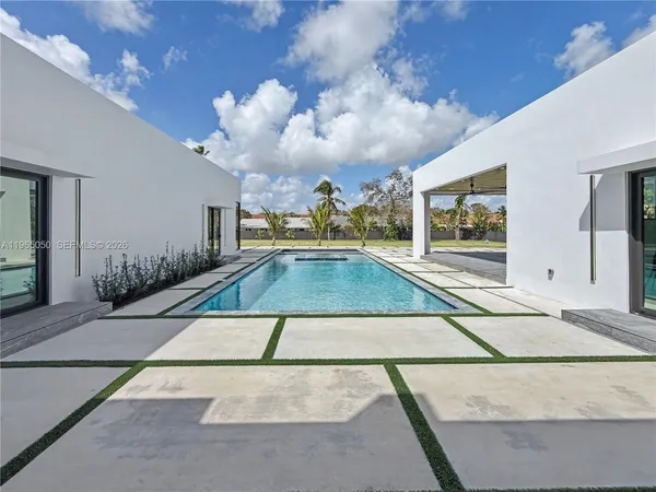 a large white room with large windows