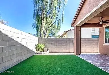 a view of a back yard of the house