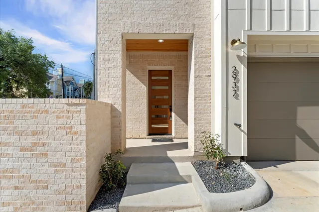 a bathroom with a bathtub and window