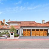 front view of a house with a garden