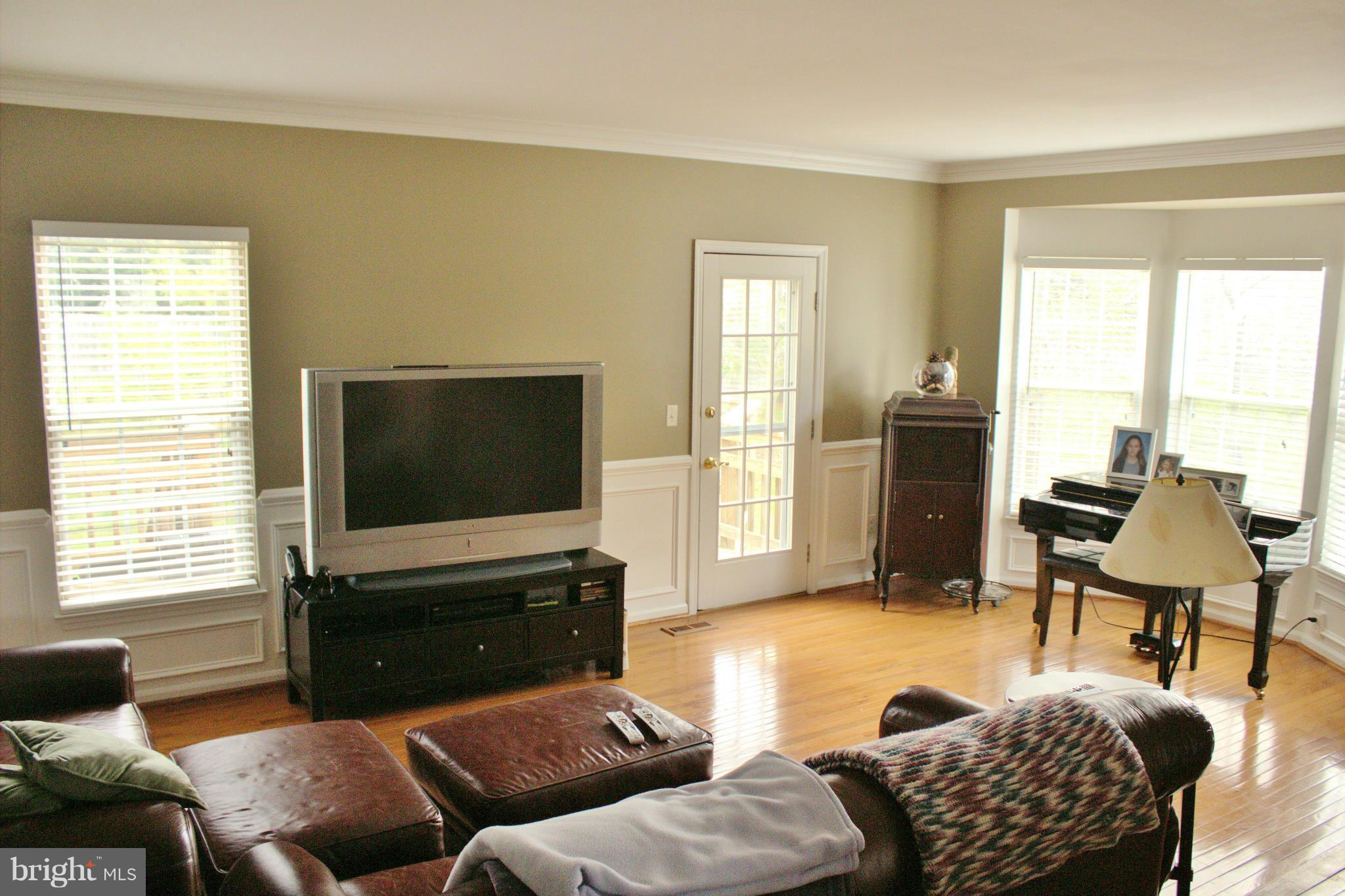 6009 Bingley Road Alexandria, VA 22315 - Photo 7 of 30 Large Living Room Full of Windows