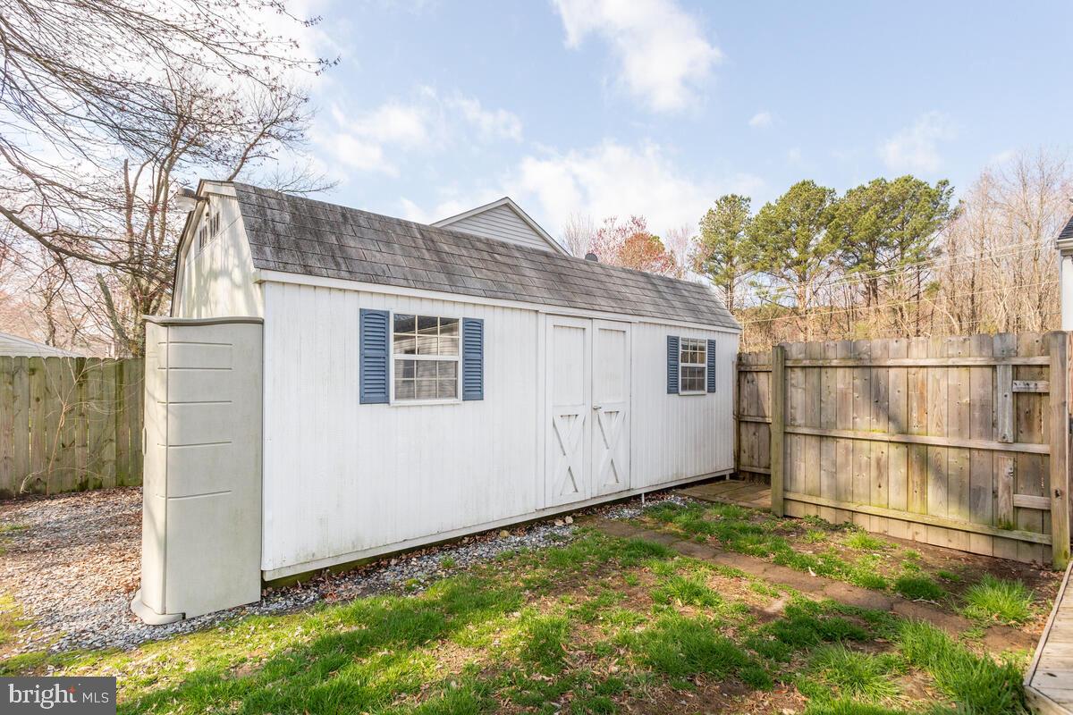 622 Old Love Point Road Stevensville, MD 21666 - Photo 26 of 38 Huge shed additional pull up door along driveway