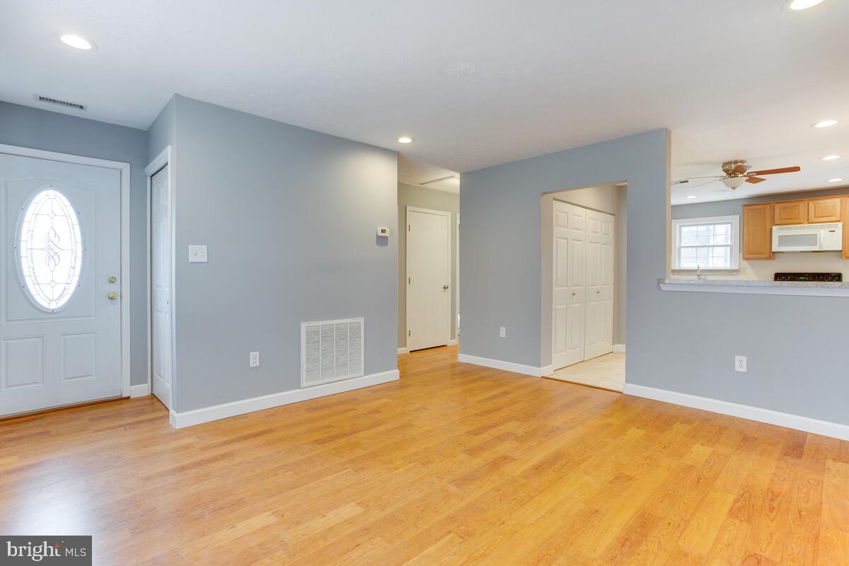 622 Old Love Point Road Stevensville, MD 21666 - Photo 5 of 38 Living Room with Recessed Lighting