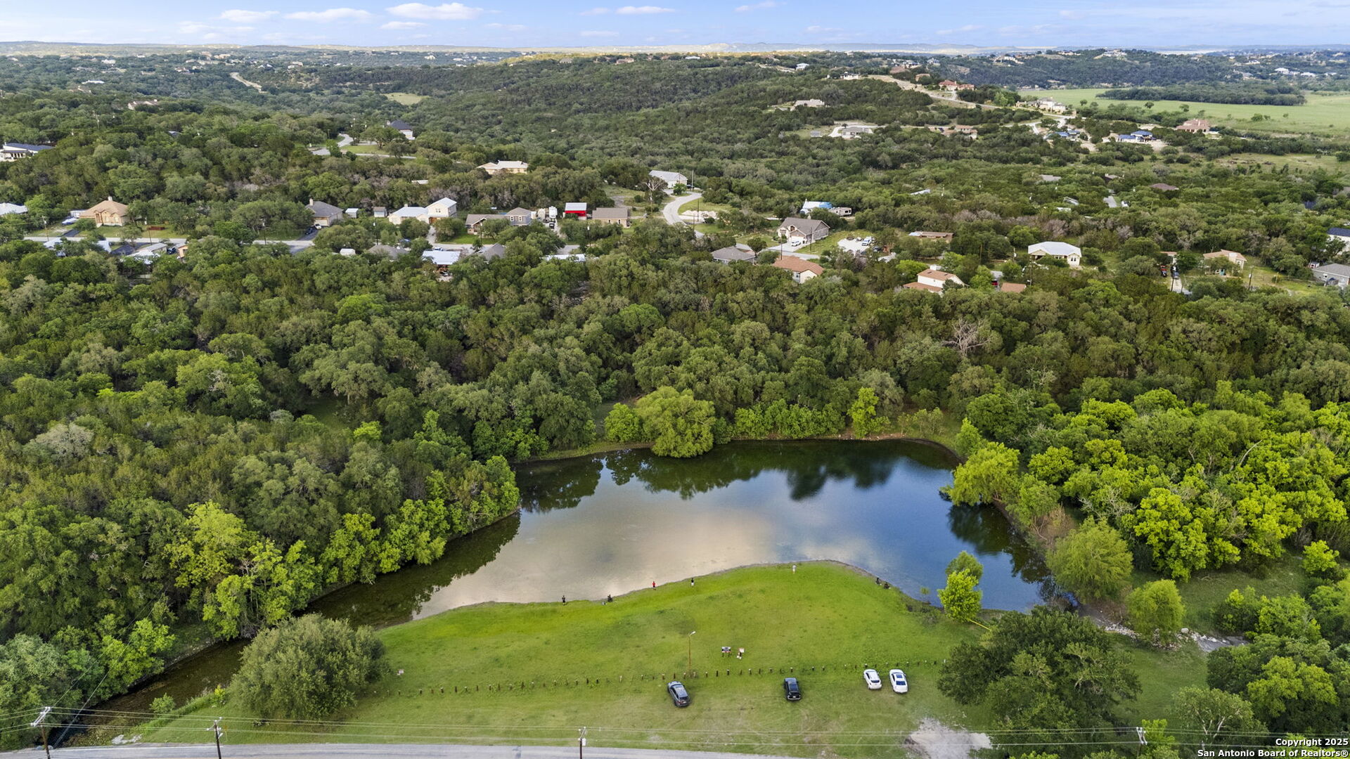 2807 Campestres Spring Branch, TX 78070 - Photo 4 of 4 an aerial view of residential houses with outdoor space and trees
