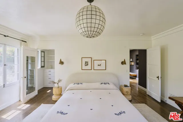 a bathroom with a granite countertop sink mirror shower and a mirror