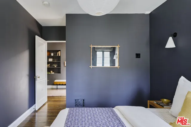 a kitchen with a sink cabinets and a window