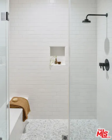 a kitchen with a sink cabinets and appliances
