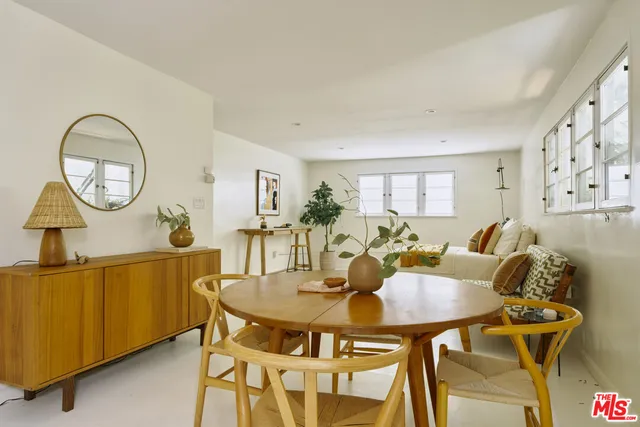 a view of a room with window and toys