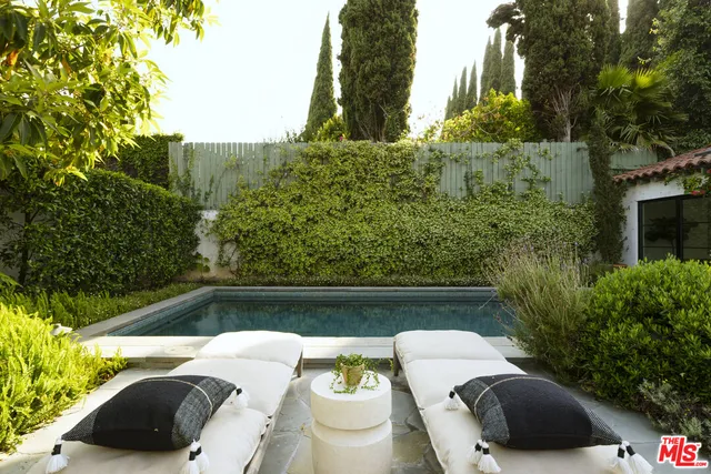 a view of a wooden floor and a tree