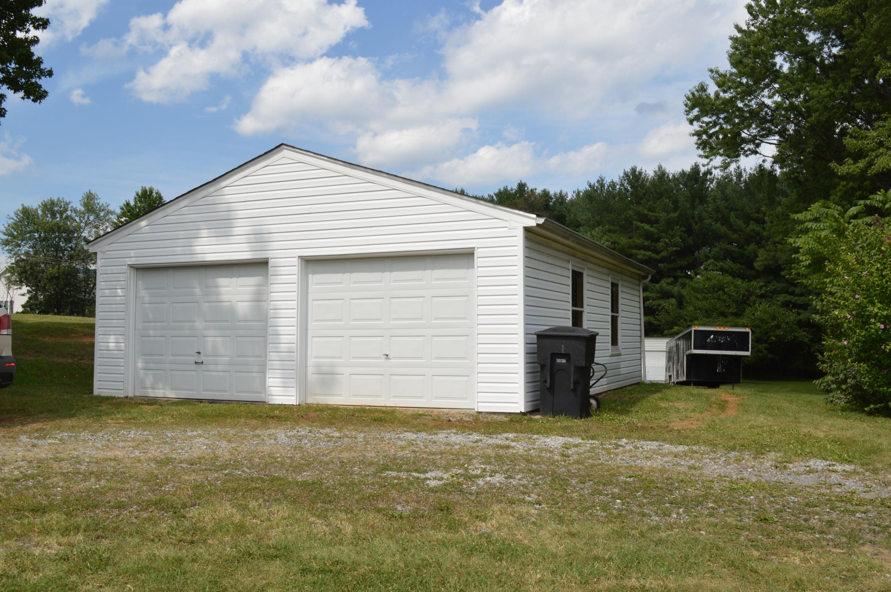 5527 Cove Road Roanoke, VA 24019 - Photo 13 of 39 a view of a house with a yard