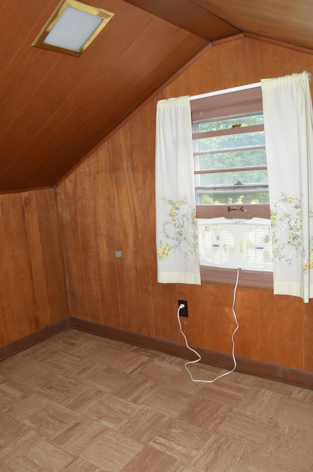 5527 Cove Road Roanoke, VA 24019 - Photo 24 of 39 a view of an empty room with a window