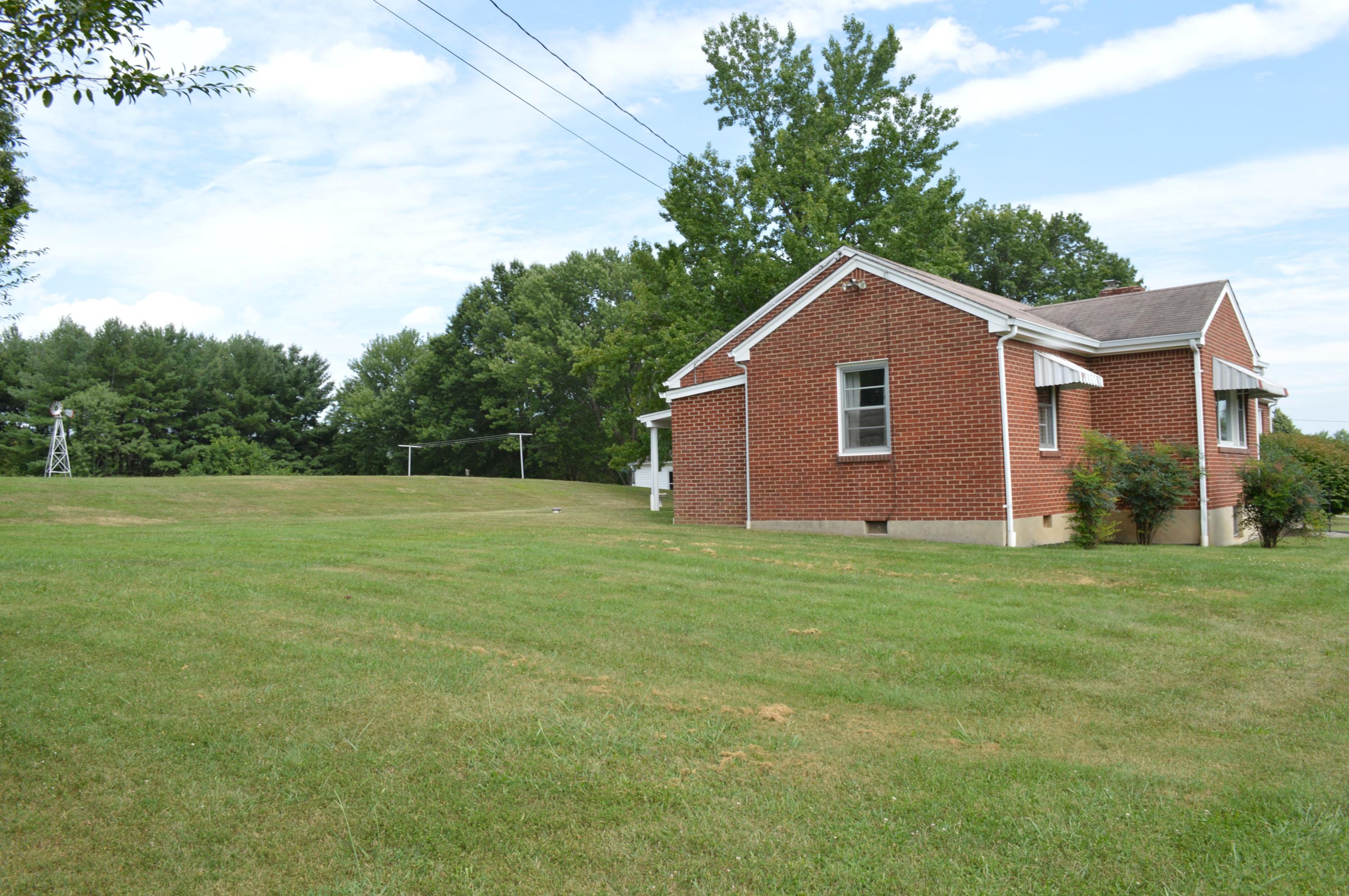 5527 Cove Road Roanoke, VA 24019 - Photo 7 of 39 a view of a house with a yard